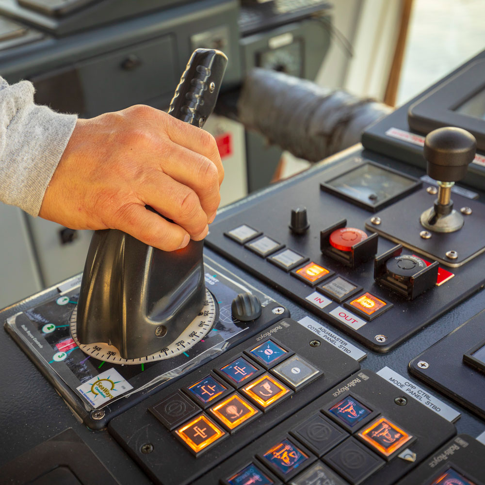 A hand on vessel controls