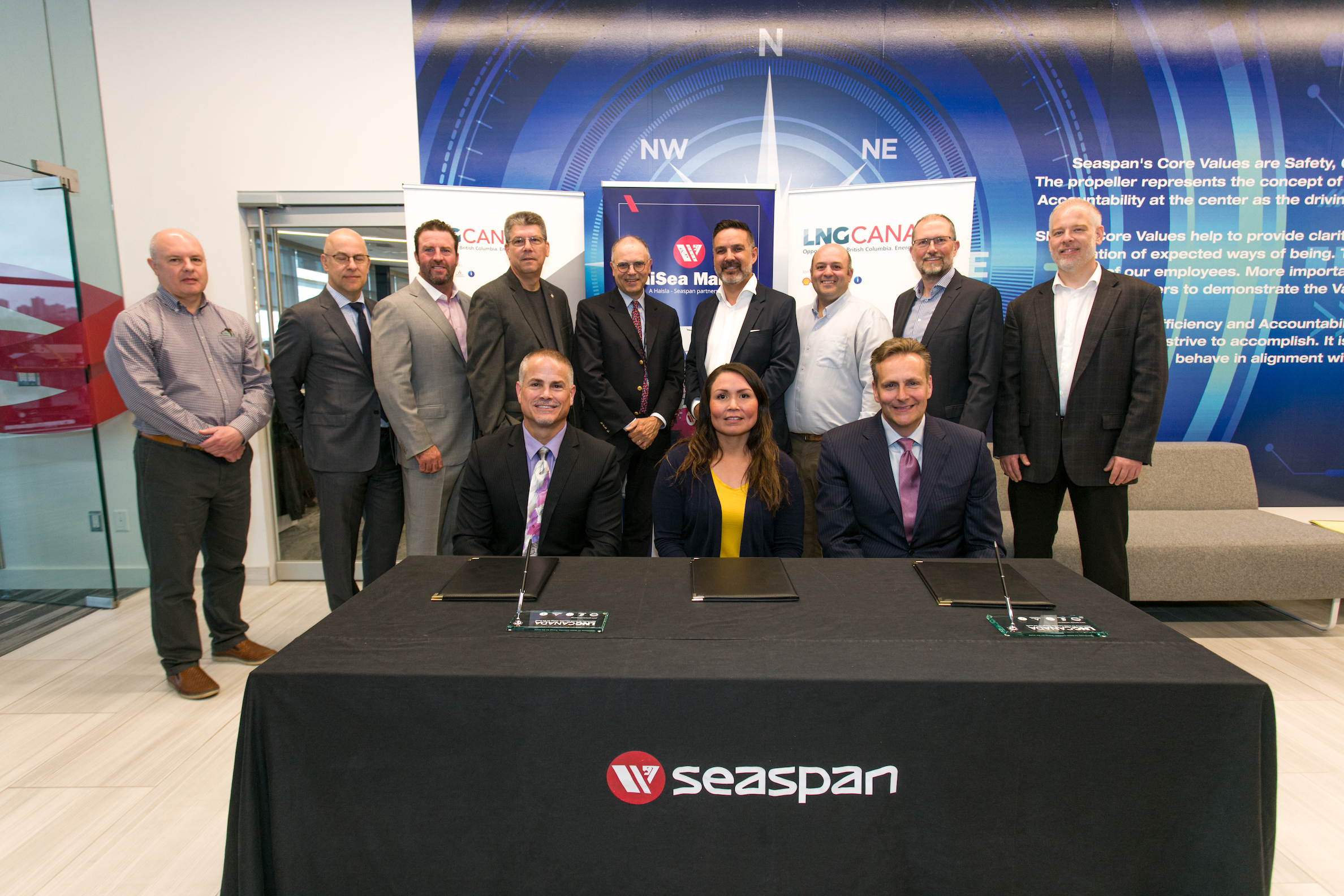 Front row L to R: Bart Reynolds, President Seaspan Marine, Crystal Smith, Chief Councillor Haisla Nation, Frank Butzelaar, CEO Seaspan Marine Transportation – Back row: Representatives from Seaspan, the Haisla Nation and union leadership witnessed the signing of the agreement.